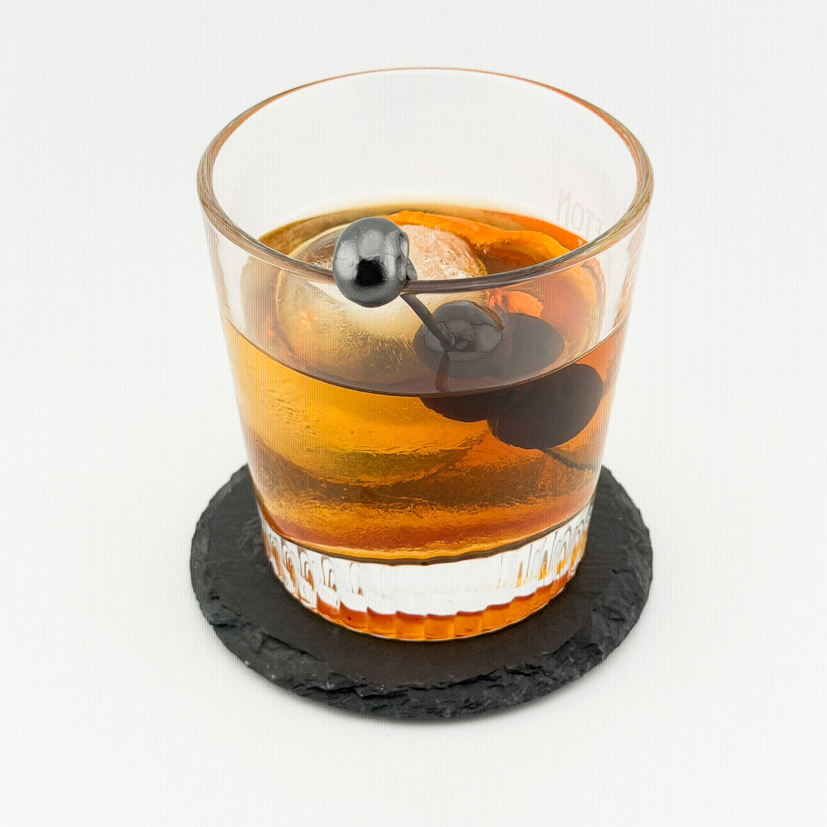 Engraved Slate Coaster - with a drink, in use