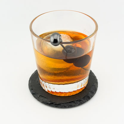 Engraved Slate Coaster - with a drink, in use