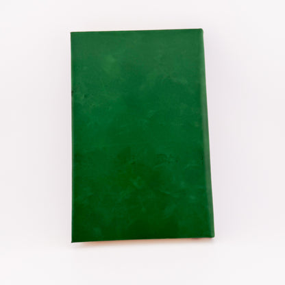 Back cover of green engraved journal