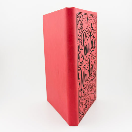 Santa's Watching journal, angled view of engraved cover