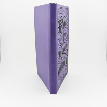 Fictional Men I'd Leave My Husband For journal, angled view of engraved cover